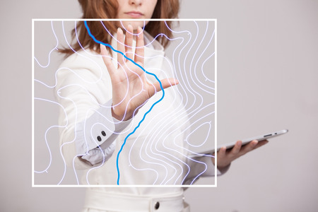 Photo of person touching a map